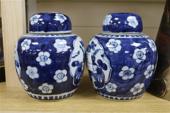 A pair of Chinese blue and white jars and covers